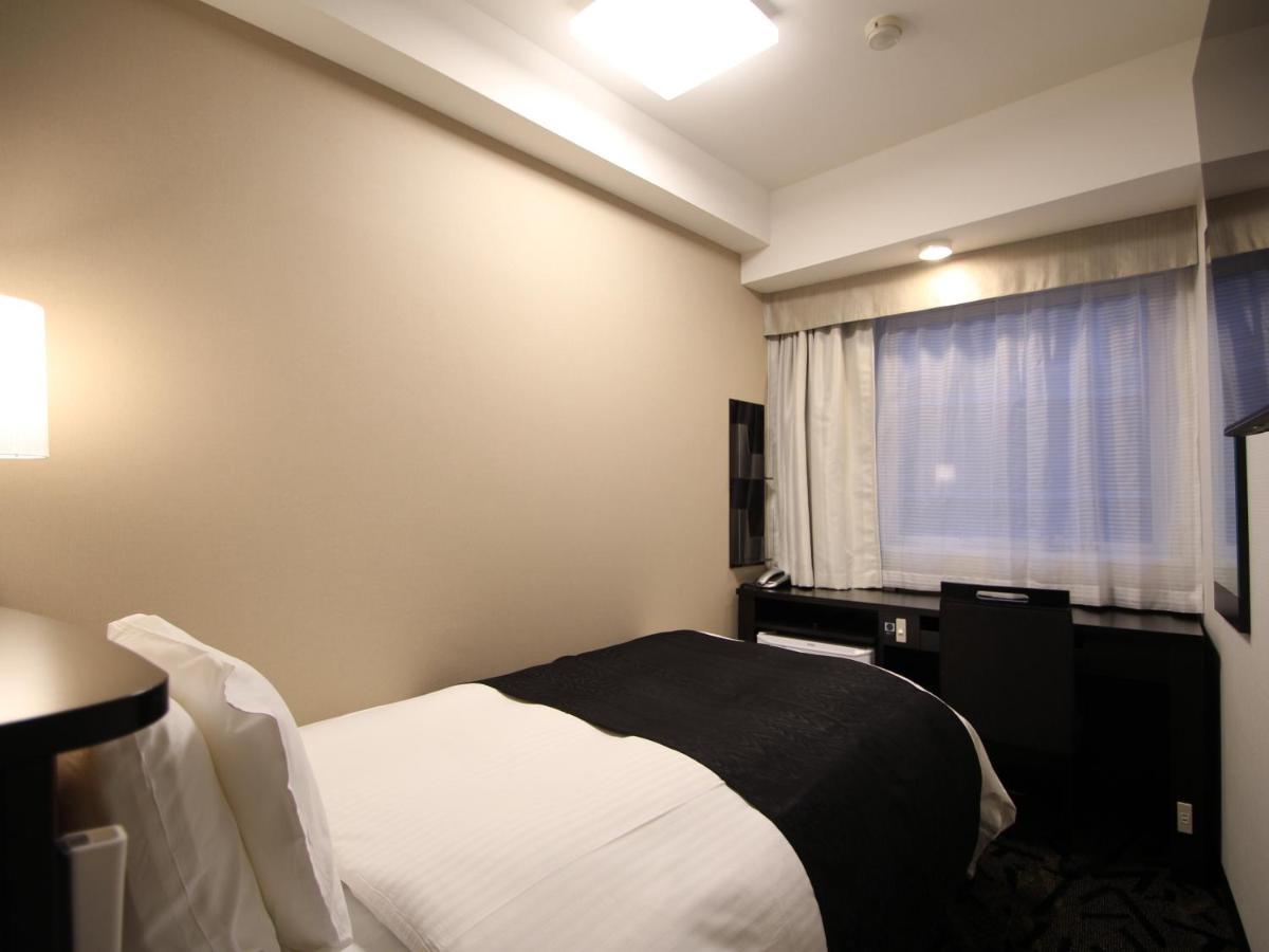 Apa Hotel Toyama Ekimae Buitenkant foto